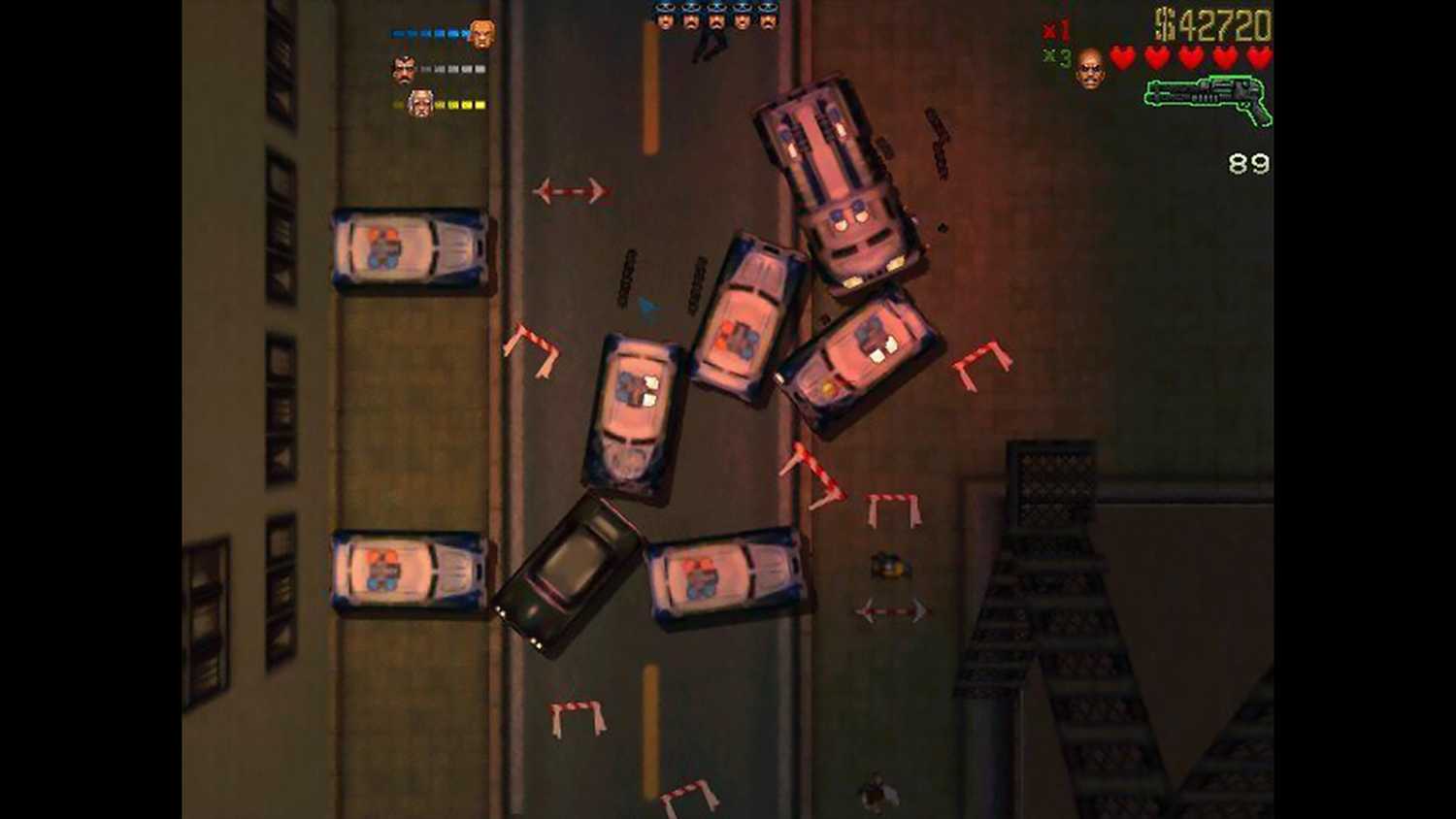 Top-down view of the player driving into a police blockade causing mayhem