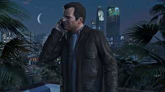 Michael taking a phone call with the backdrop of Los Santos' cityscape