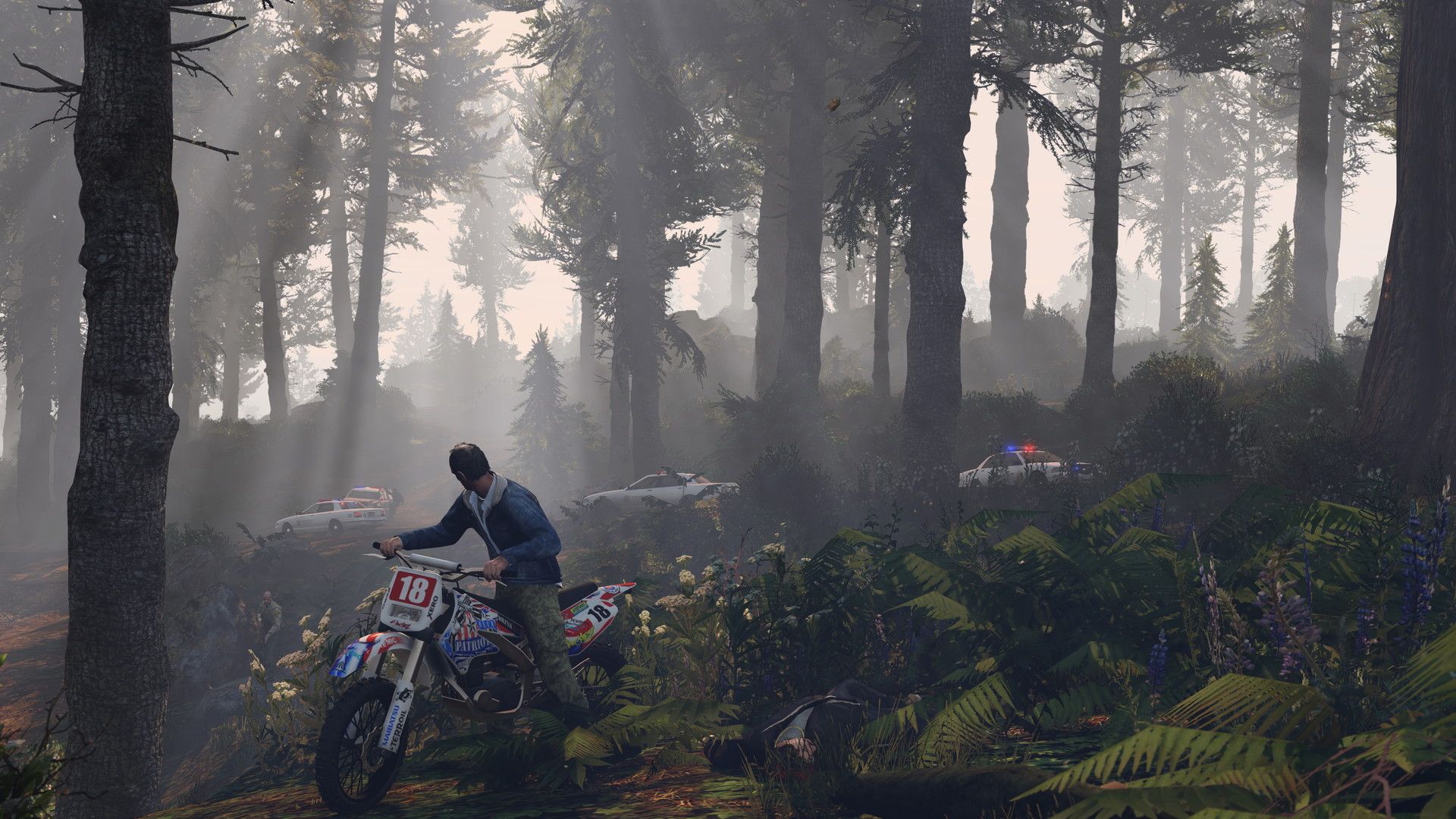 Trevor riding a dirt bike in a forest