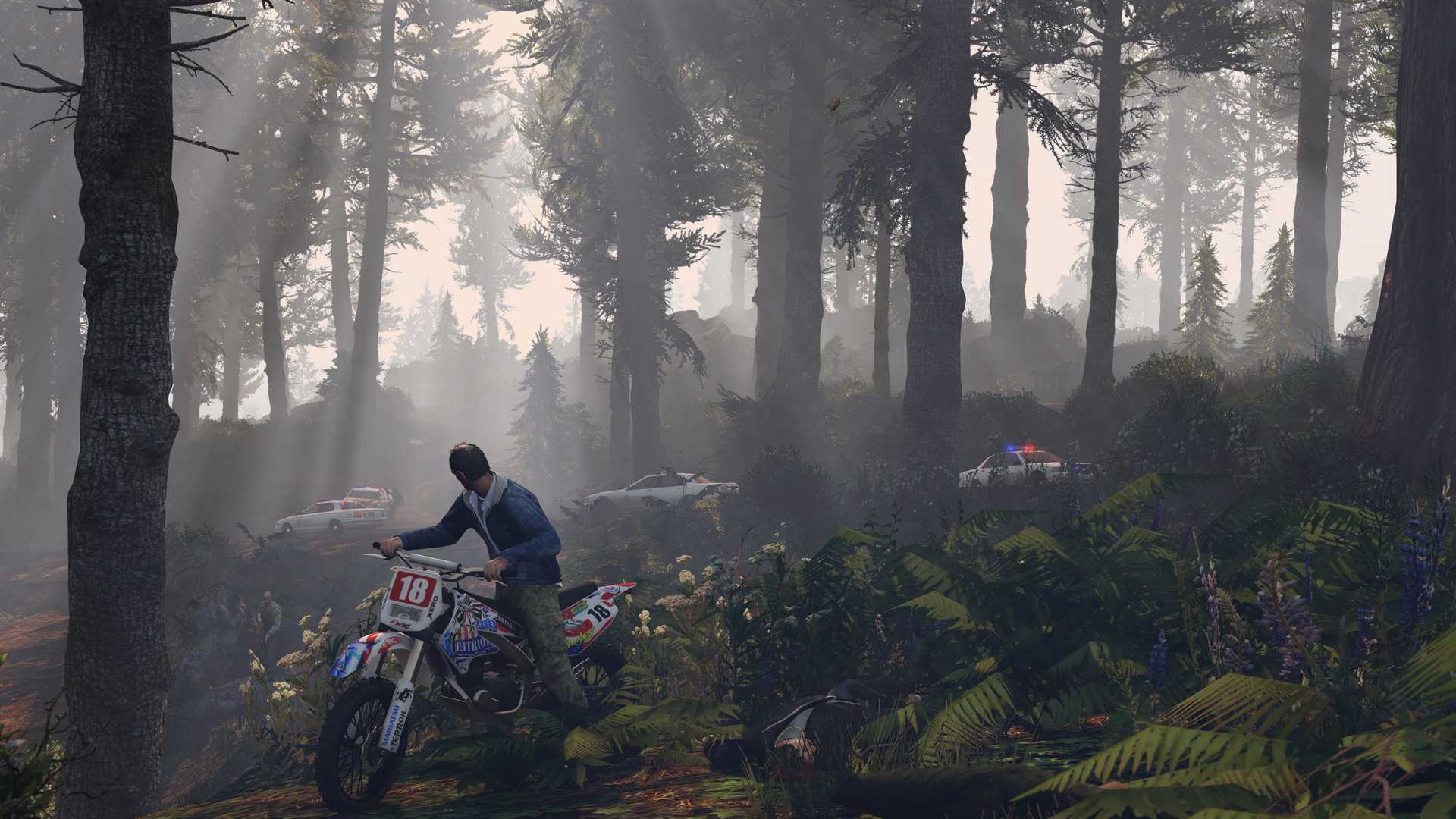 Trevor riding a dirt bike in a forest