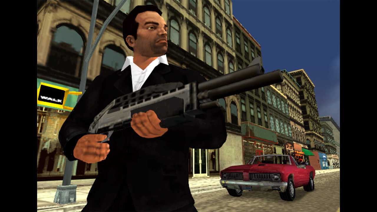 Tony aiming his sawed off shotgun at something off-camera with parked car in the background.