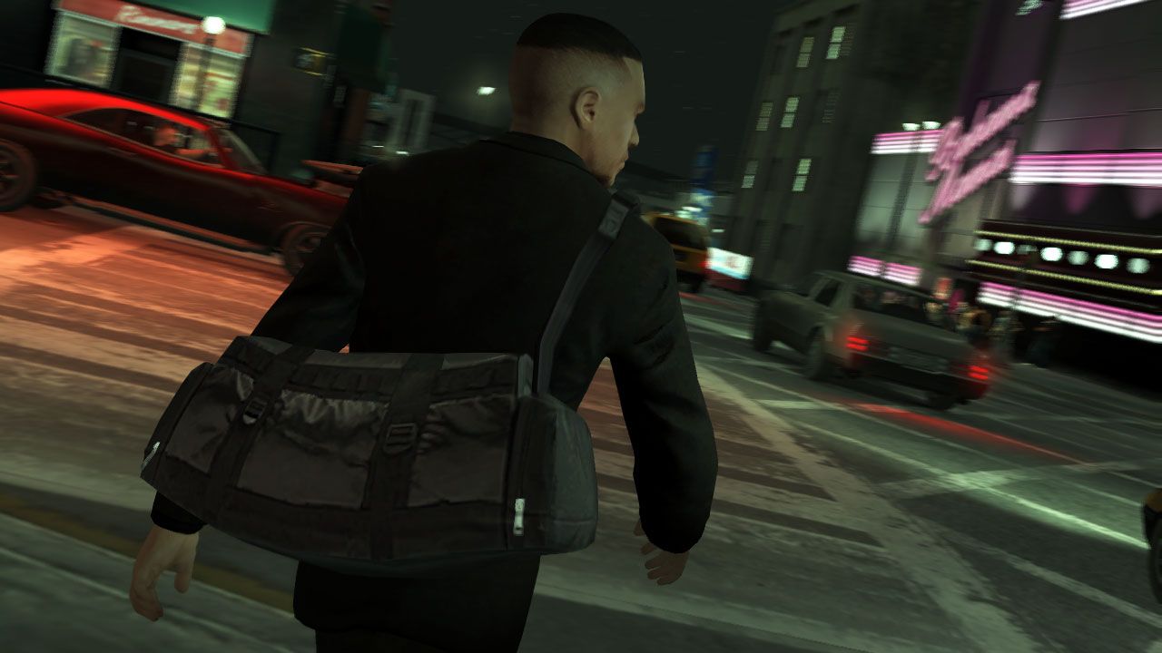 Luis crossing a road with a money bag strapped on his back