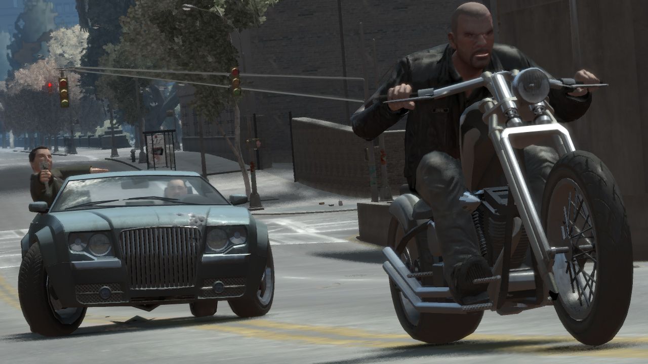 A drive-by turning into a chase as Johnny rides his bike away from the car in the background