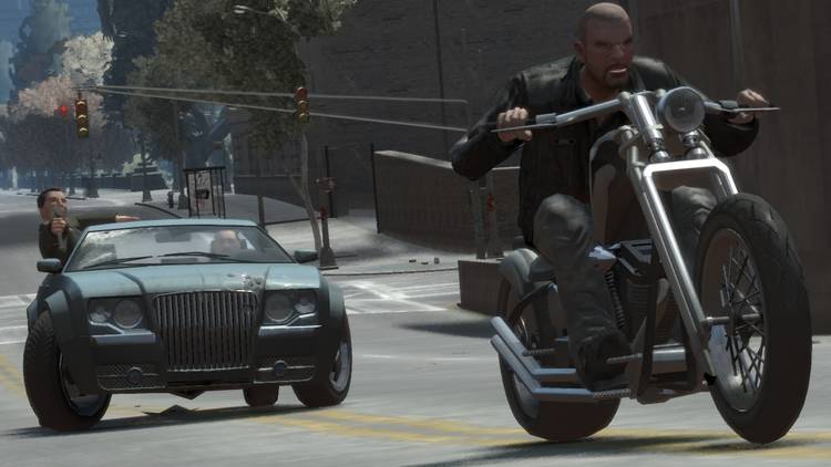 A drive-by turning into a chase as Johnny rides his bike away from the car in the background