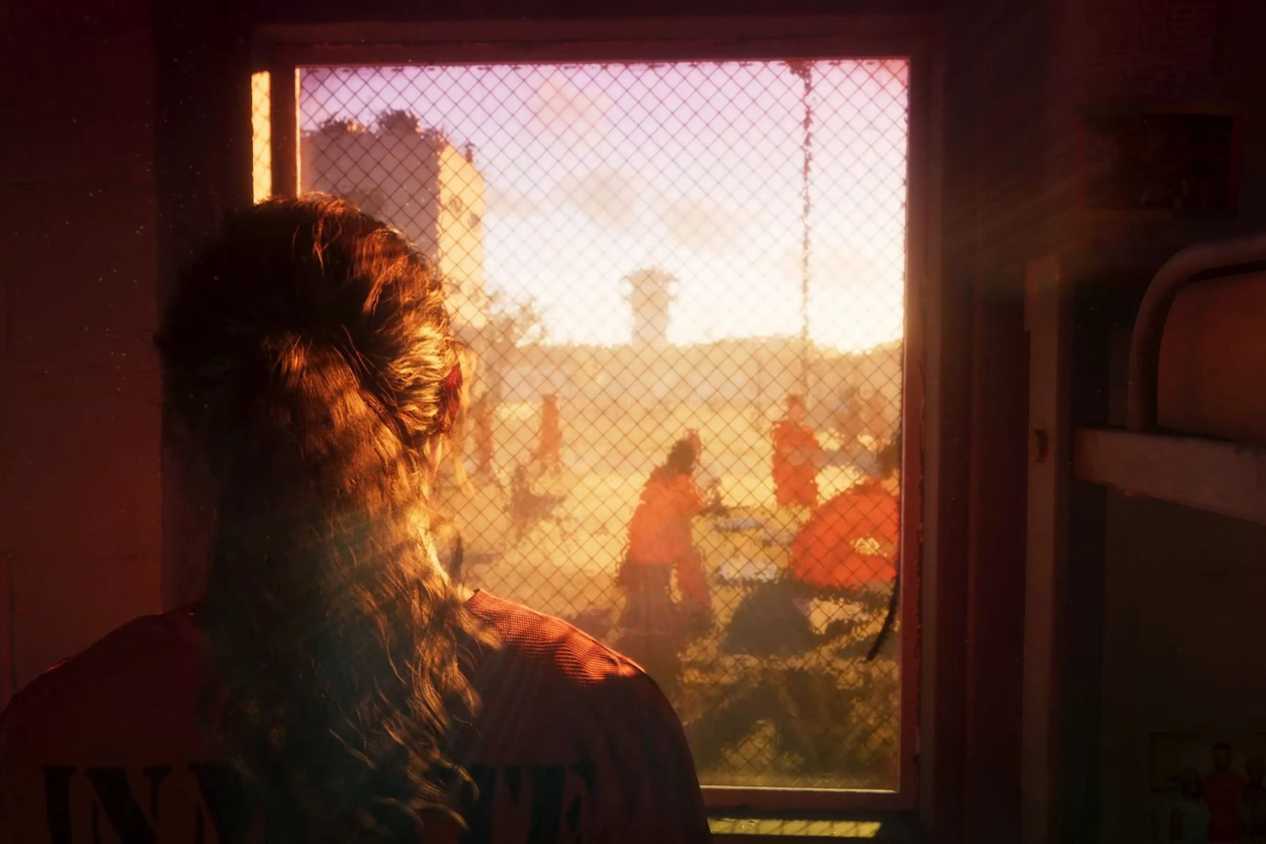 GTA VI Lucia staring out of prison window