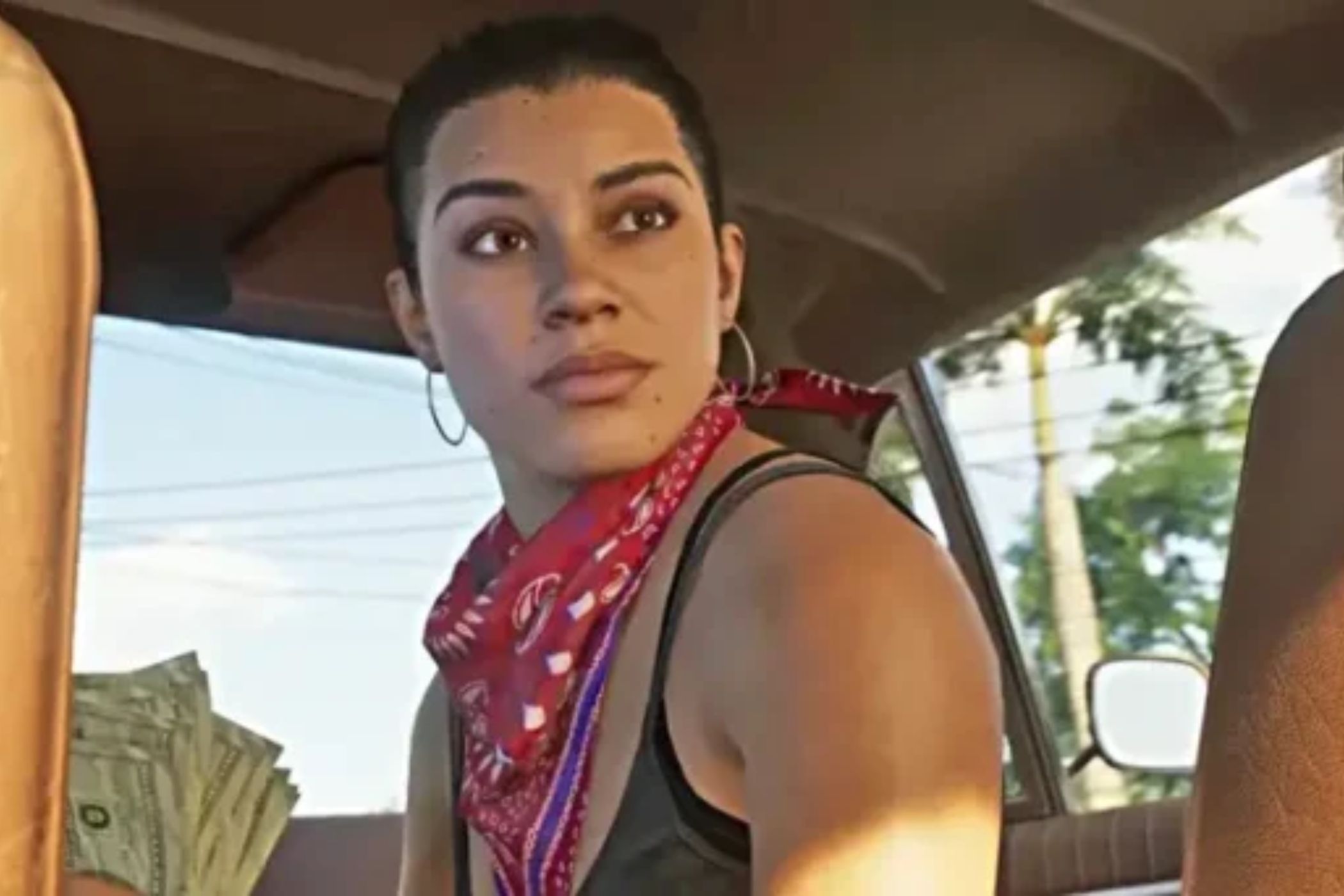 GTA VI Lucia sitting in car with cash