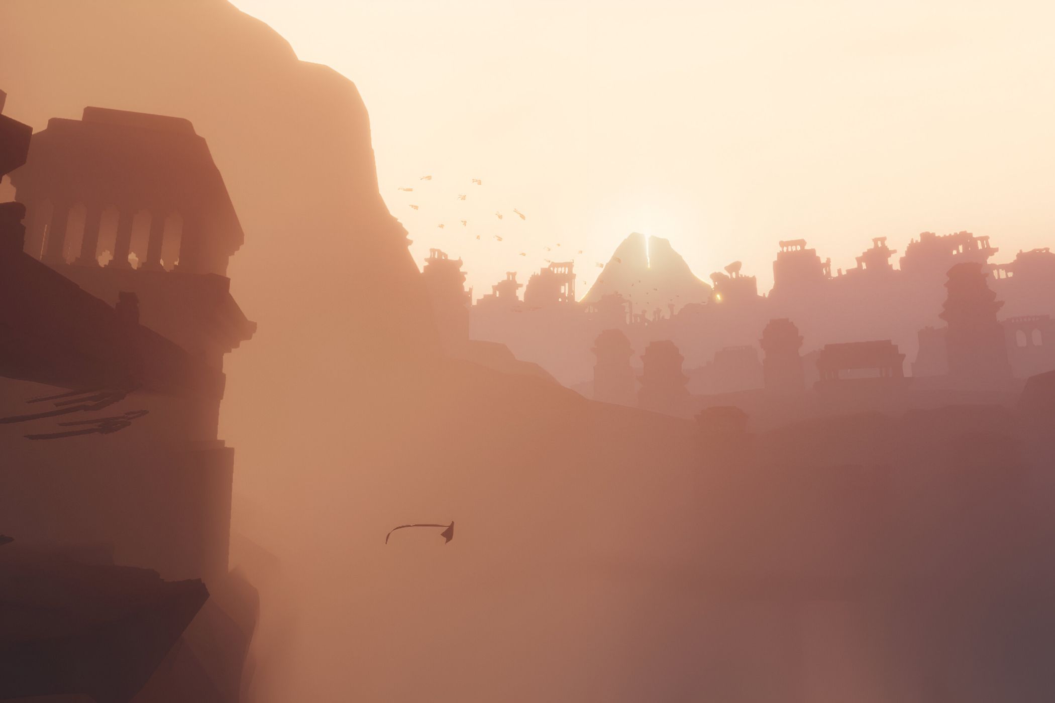 A screenshot from the game Journey, showing the protagonist floating against a huge backdrop of buildings and hills.
