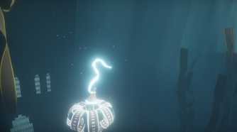 A screenshot from the game Journey, showing the protagonist's robes glow as they float through a dark, blue, environment.