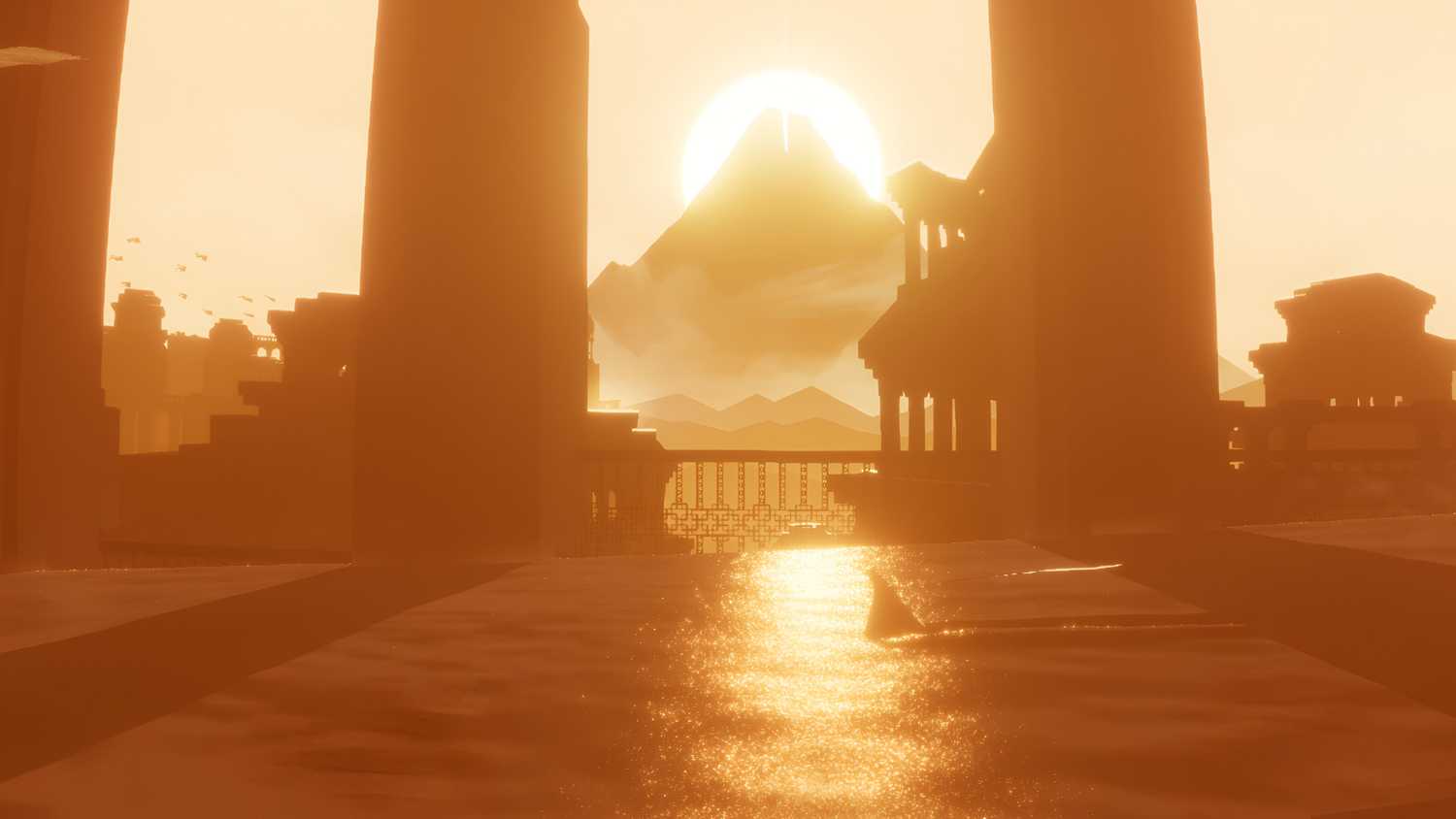 A screenshot from the game Journey, showing a beautifully lit desert landscape as the sunlight turns everything golden, and the protagonist walks through sand.