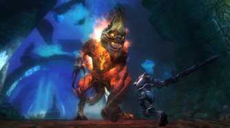 Screenshot from Kingdoms of Amalur: Reckoning video game of character fighting giant masked fire monster