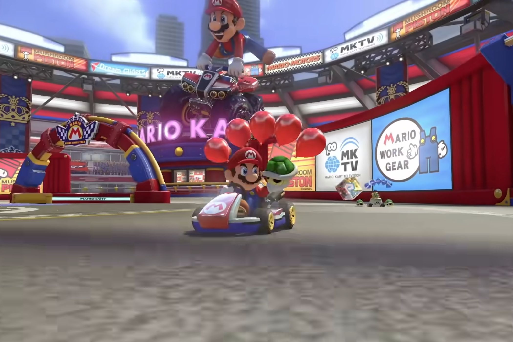 Mario Kart 8 Mario holding shell with balloons on kart