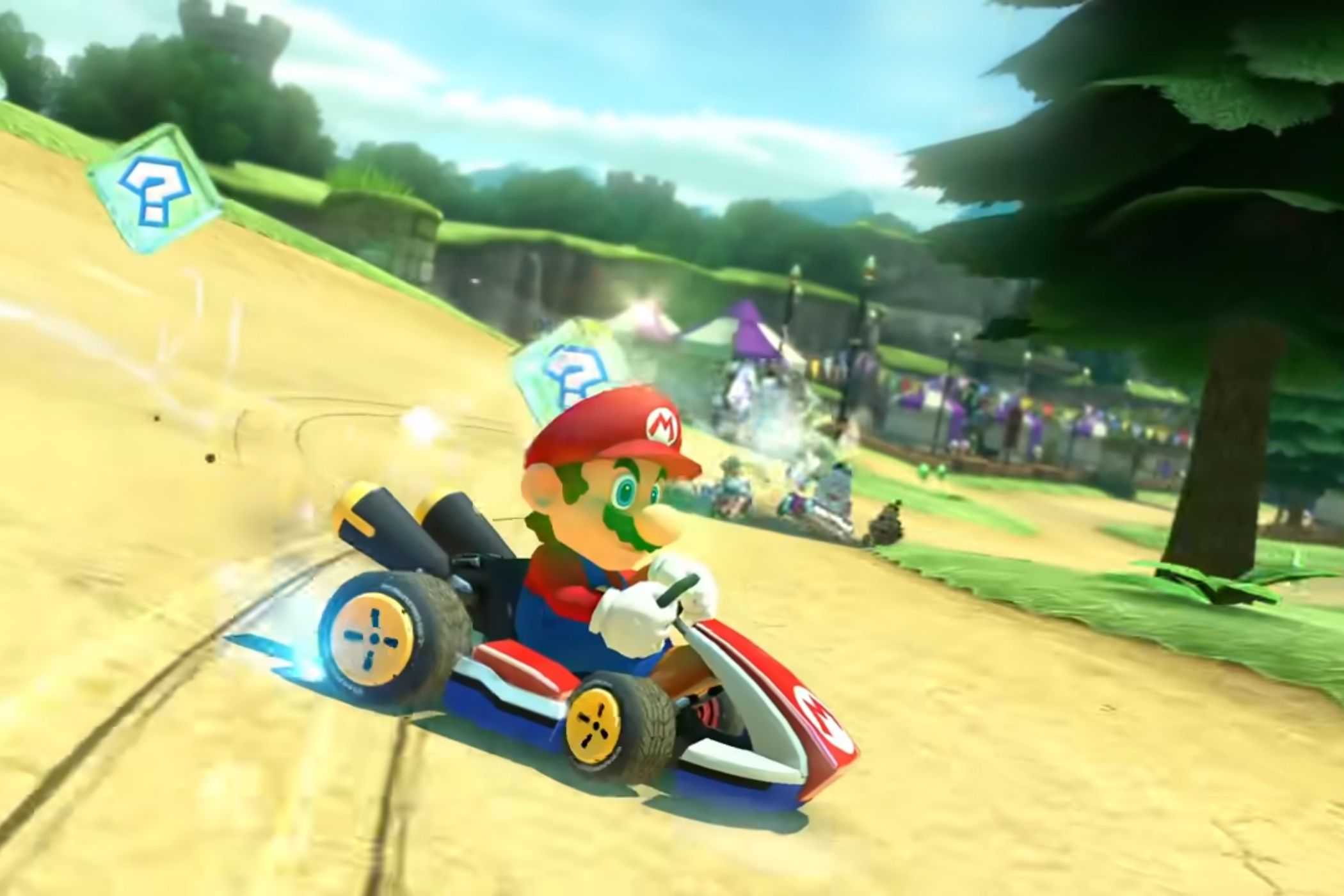 Mario Kart 8 Mario drifting around grassy forest