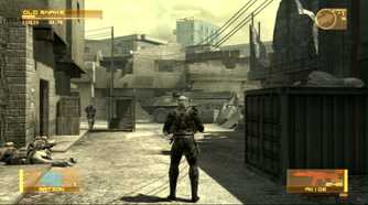 Sceenshot from Metal Gear Solid 4: Guns of the Patriots video game of player character standing in war-torn street with a tank on the road and an armed man to the left.