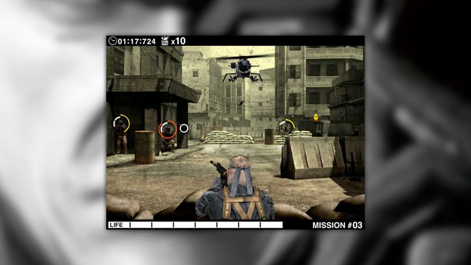Metal Gear Solid Touch screenshot of Snake shooting at enemies as a helicopter flies overhead
