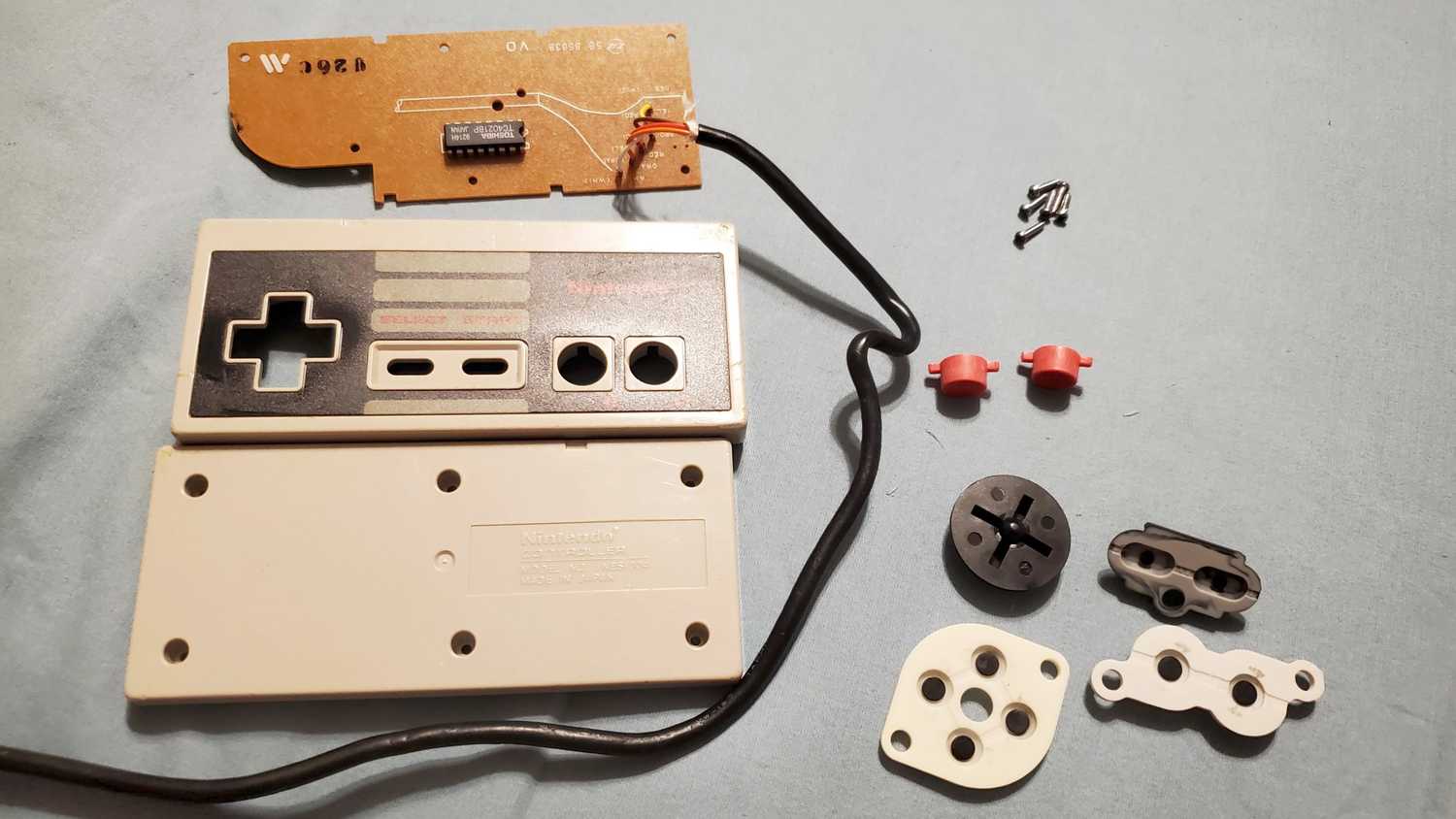 NES controller disassembled - Front