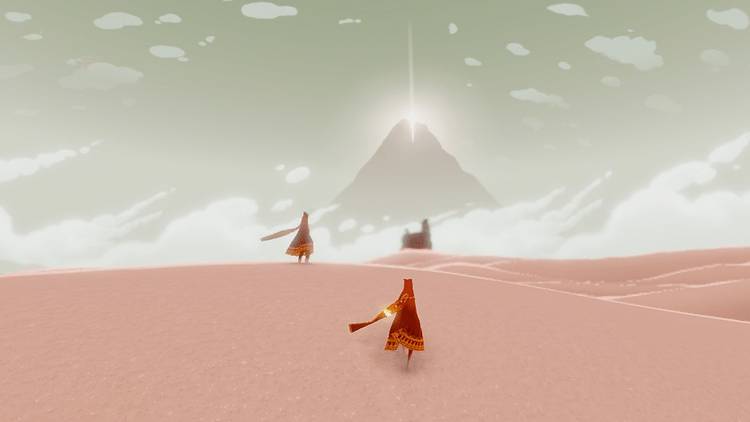 Two characters viewing the mountain destination in Journey