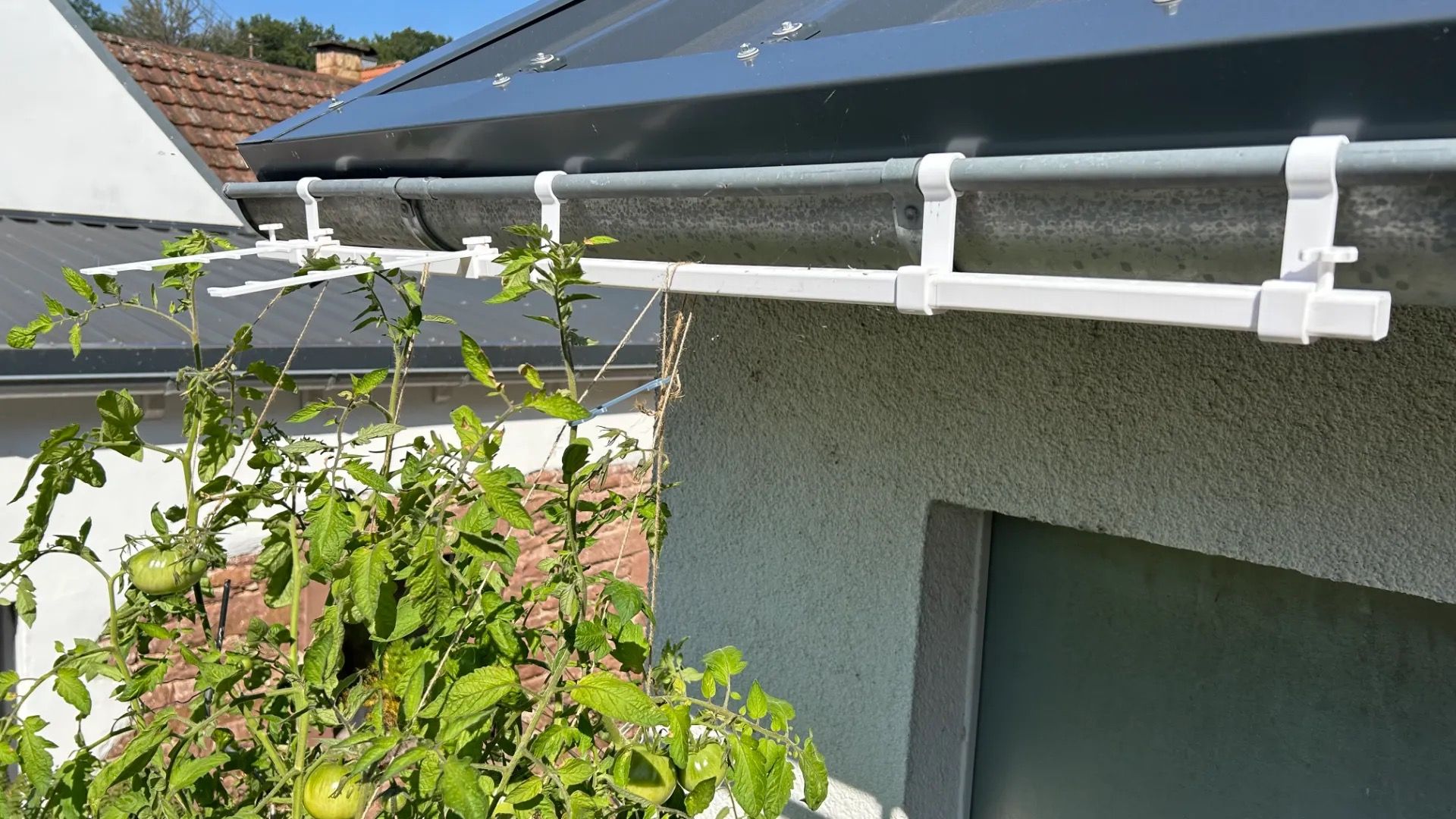 Plant support for gutters