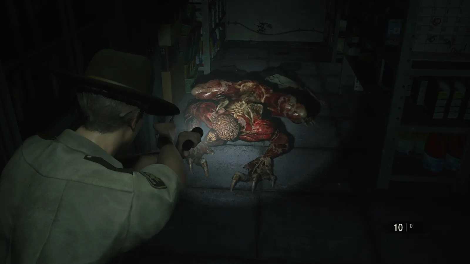 Screenshot of Resident Evil 2 video game with V-Act Nightmare mod installed of player character shining flashlight on Licker zombie.