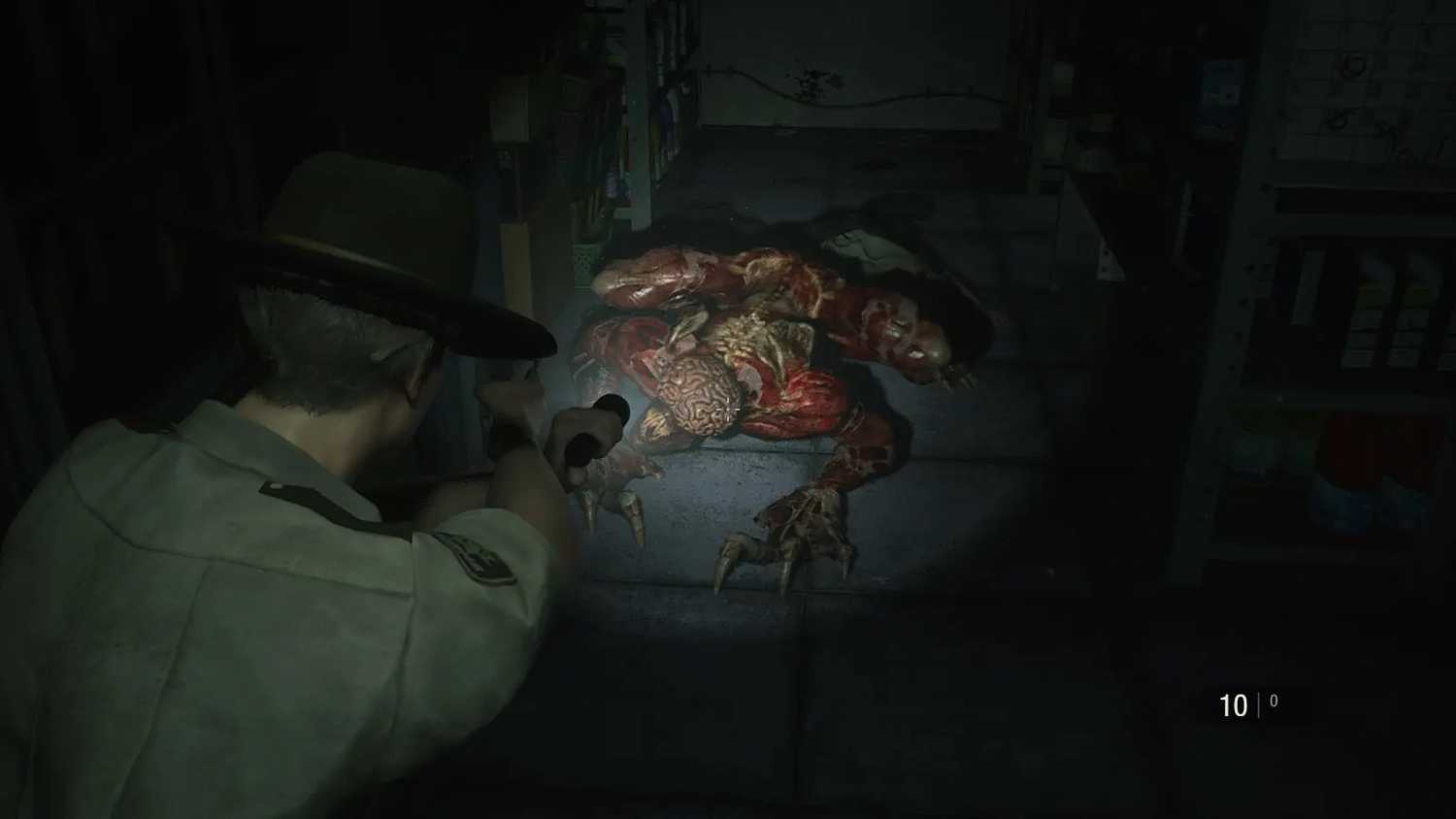Screenshot of Resident Evil 2 video game with V-Act Nightmare mod installed of player character shining flashlight on Licker zombie.