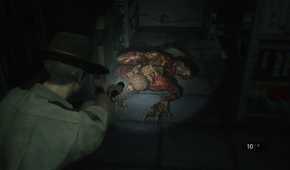 Screenshot of Resident Evil 2 video game with V-Act Nightmare mod installed of player character shining flashlight on Licker zombie.