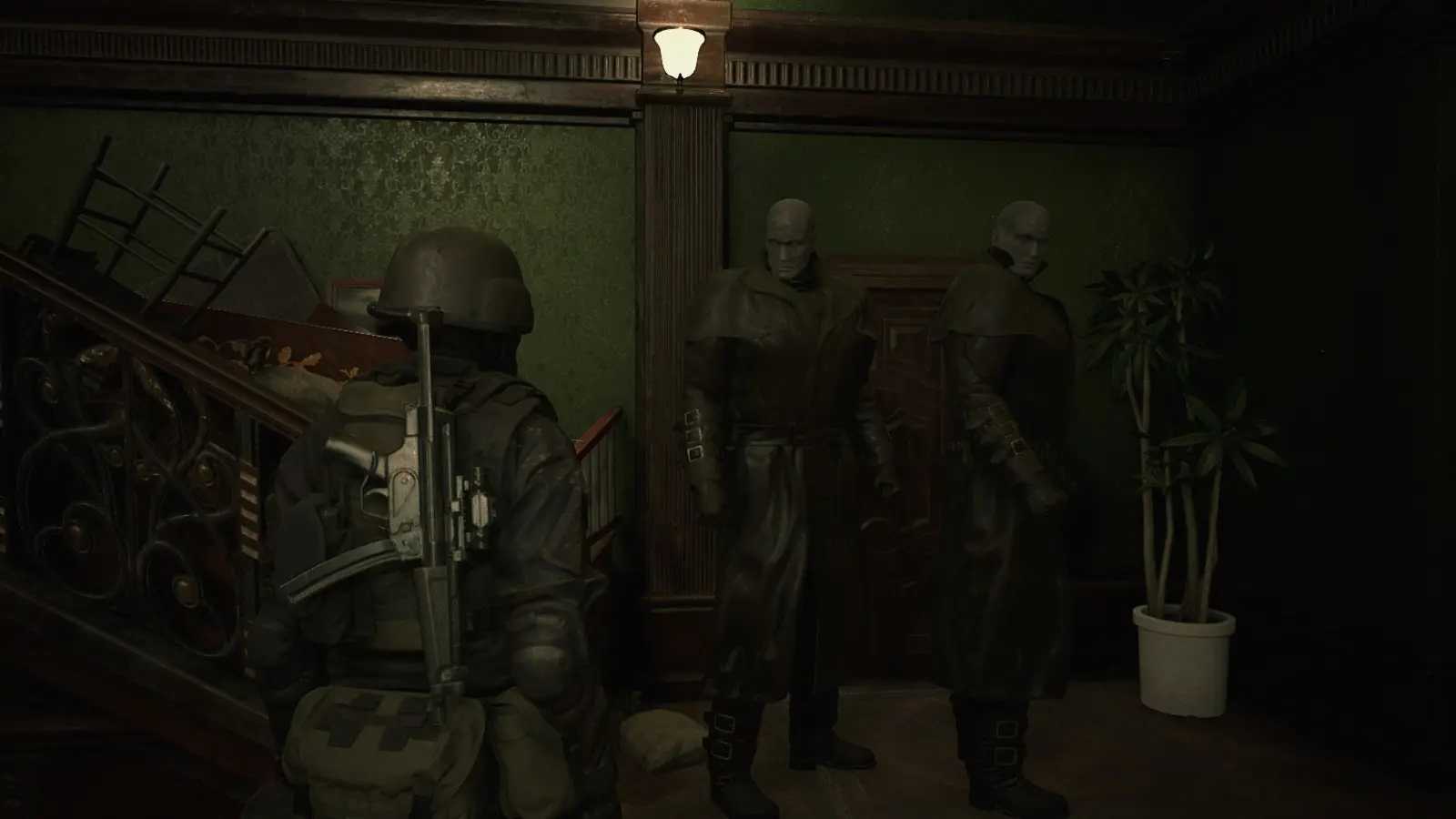 Screenshot of Resident Evil 2 video game with X-Treme Nightmare Mod installed of two Mr. X's moving towards player character in stairwell