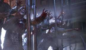 Screenshot from Resident Evil 3 Remake of zombies clamoring against a fence