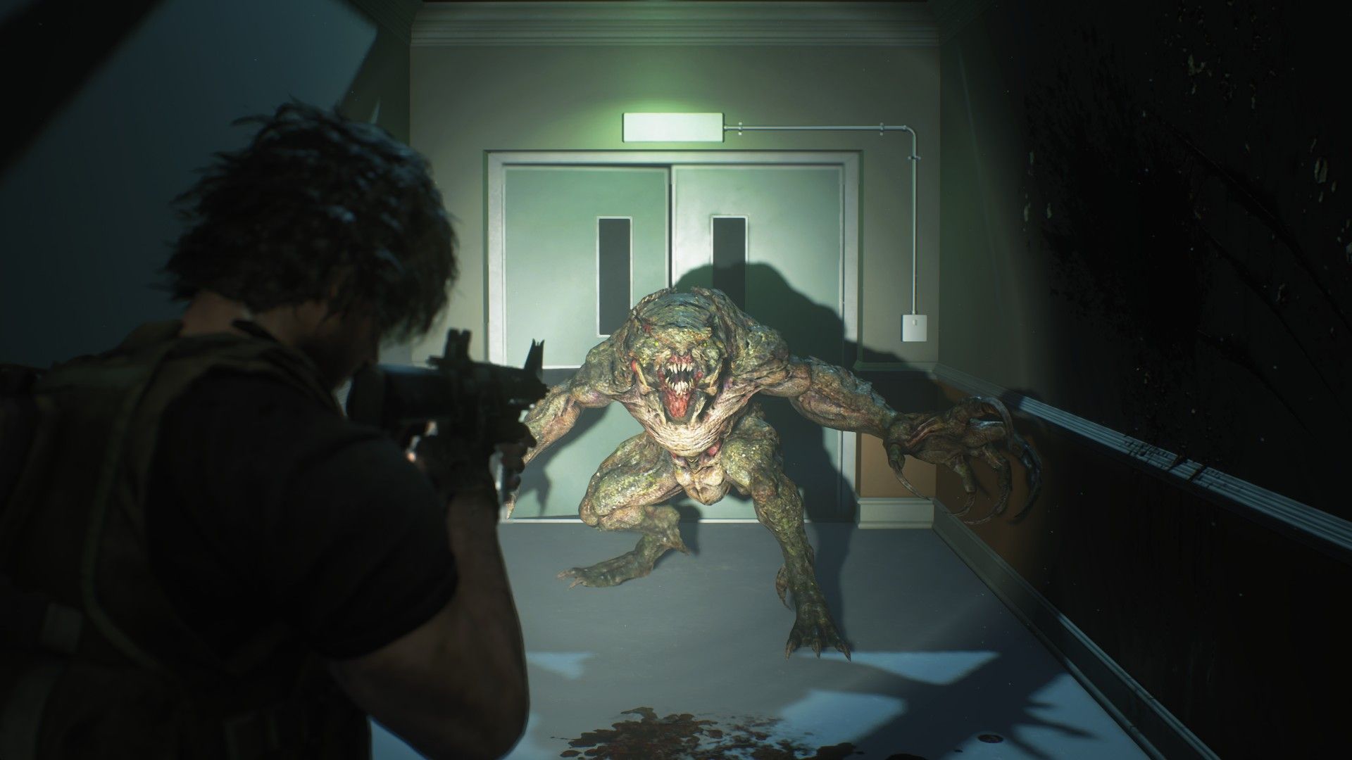 Screenshot from Resident Evil 3 Remake of player character shining a flashlight on a monster and aiming a rifle at it