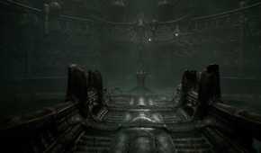 a screenshot from the game Scorn, showing a dark, metallic environment and walkway, with an altar at the end of it.