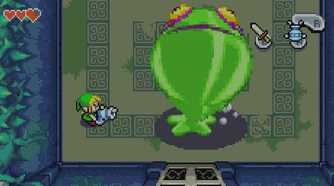Little Link fighting a big slime in The Minish Cap