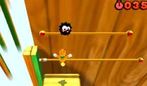 Screenshot of Tanooki Mario and a Fuzzy from Super Mario Bros. 3D Land
