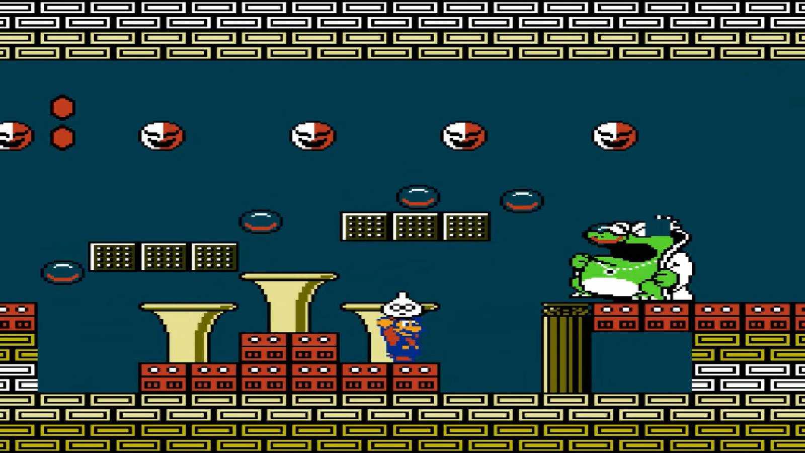 Screen shot from Super Mario Bros. 2 of Mario fighting Wart