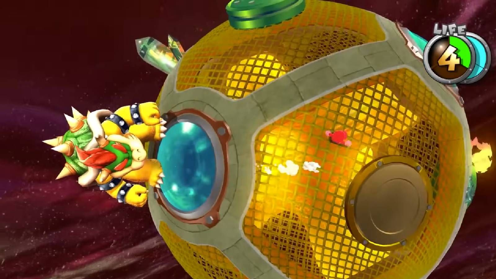 Screenshot of Super Mario Galaxy of Mario fighting Bowser