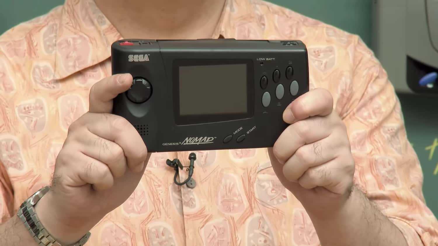 Person holding the Sega Nomad handheld