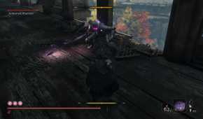 Screenshot from Sekiro: Shadows Die Twice video game with Long May the Shadows Reflect mod installed of player fighting armored warrior boss on bridge.