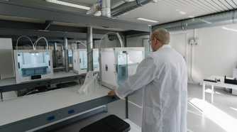 several enclosed 3D printers
