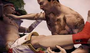A screenshot from the game Sleeping Dogs, showing Wei Shen, the protagonist, shirtless, with tattoos on his chest and arms, engaging in martial combat with a bald opponent wearing a red headband and white shorts.