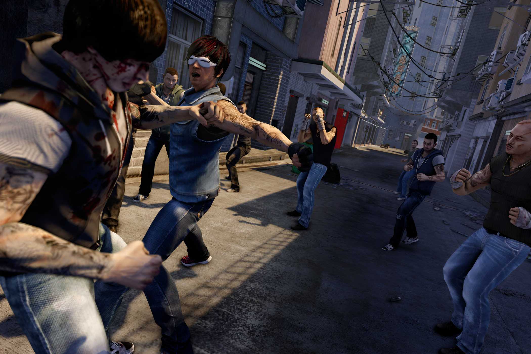 A screenshot from the game Sleeping Dogs, showing multiple characters engage ina street fight in an alley in Hong Kong.