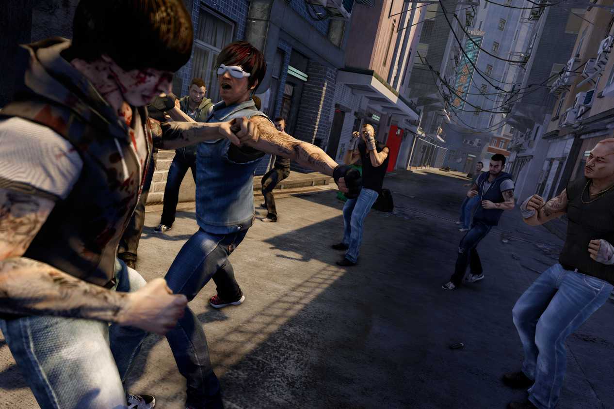 A screenshot from the game Sleeping Dogs, showing multiple characters engage ina street fight in an alley in Hong Kong.