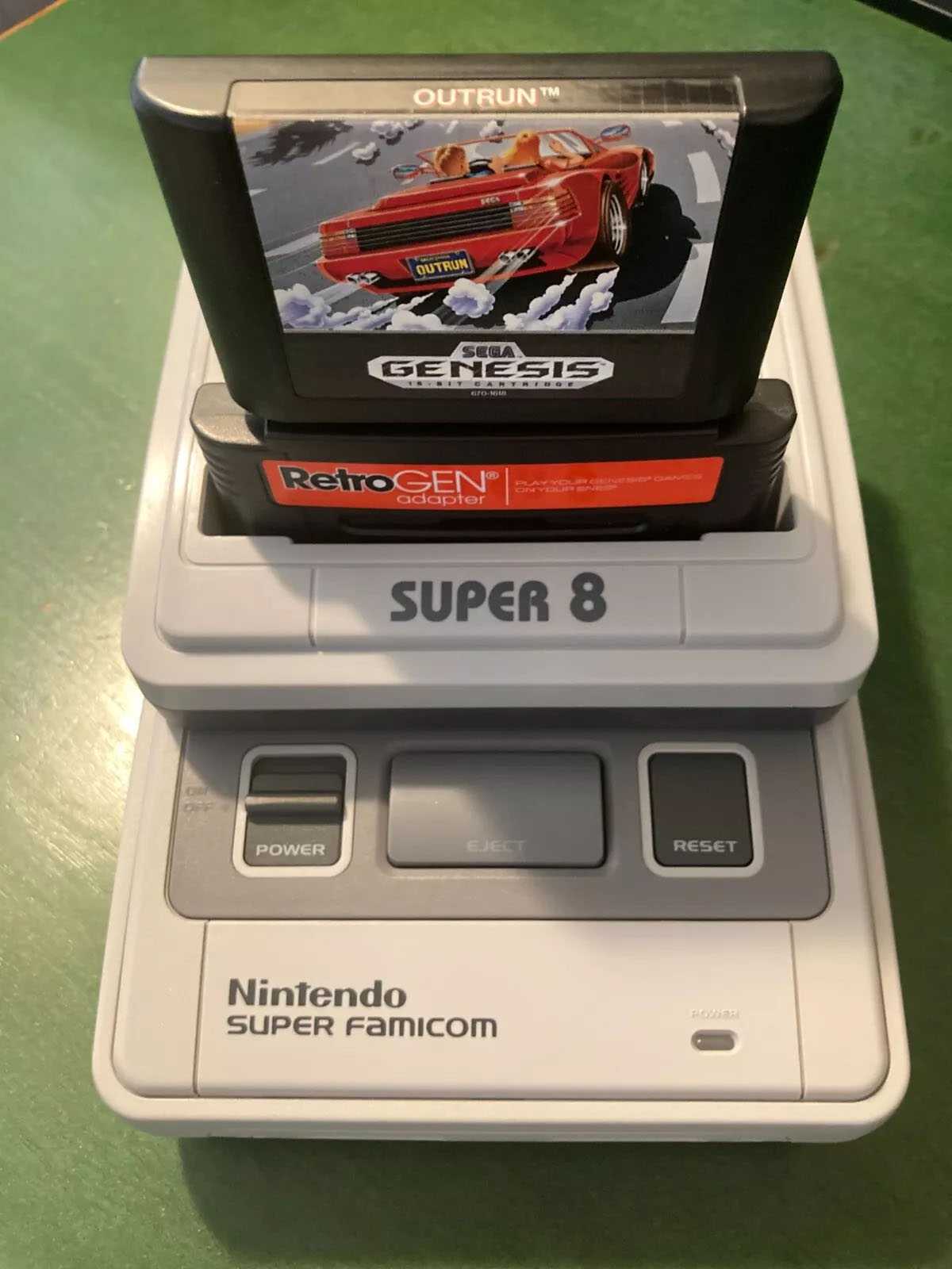Innovation Super 8 Tristar with RetroGen adapter and Sega Genesis game