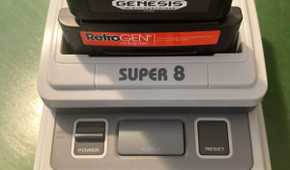 Innovation Super 8 Tristar with RetroGen adapter and Sega Genesis game