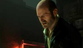 A screenshot from the game Uncharted 2, showing Charlie Cutter, a bald man, wearing a suit with a grimace on his face.