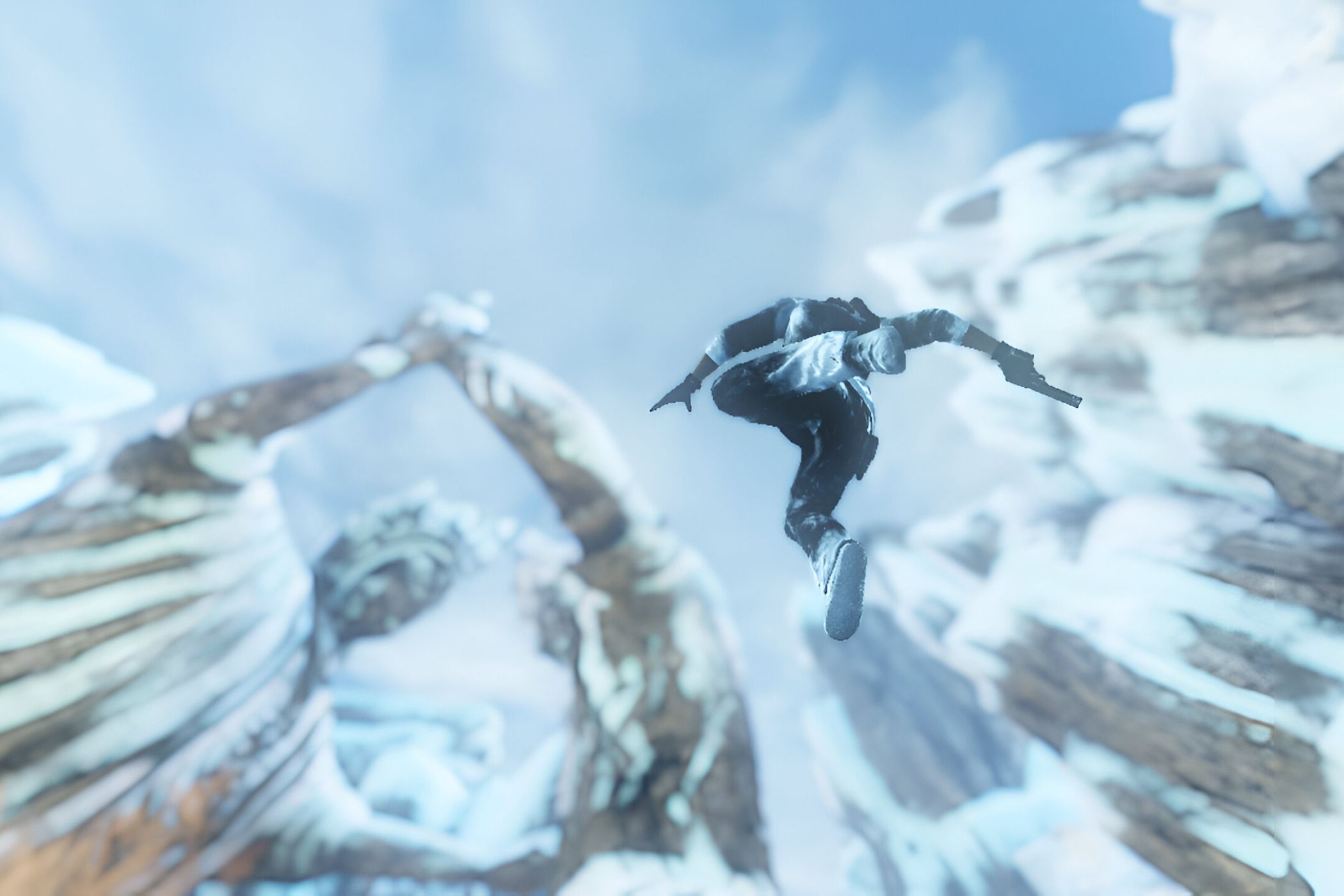 A screenshot from the game Uncharted 2, showing tall, stony statues covered in snow as a human falls down from them.