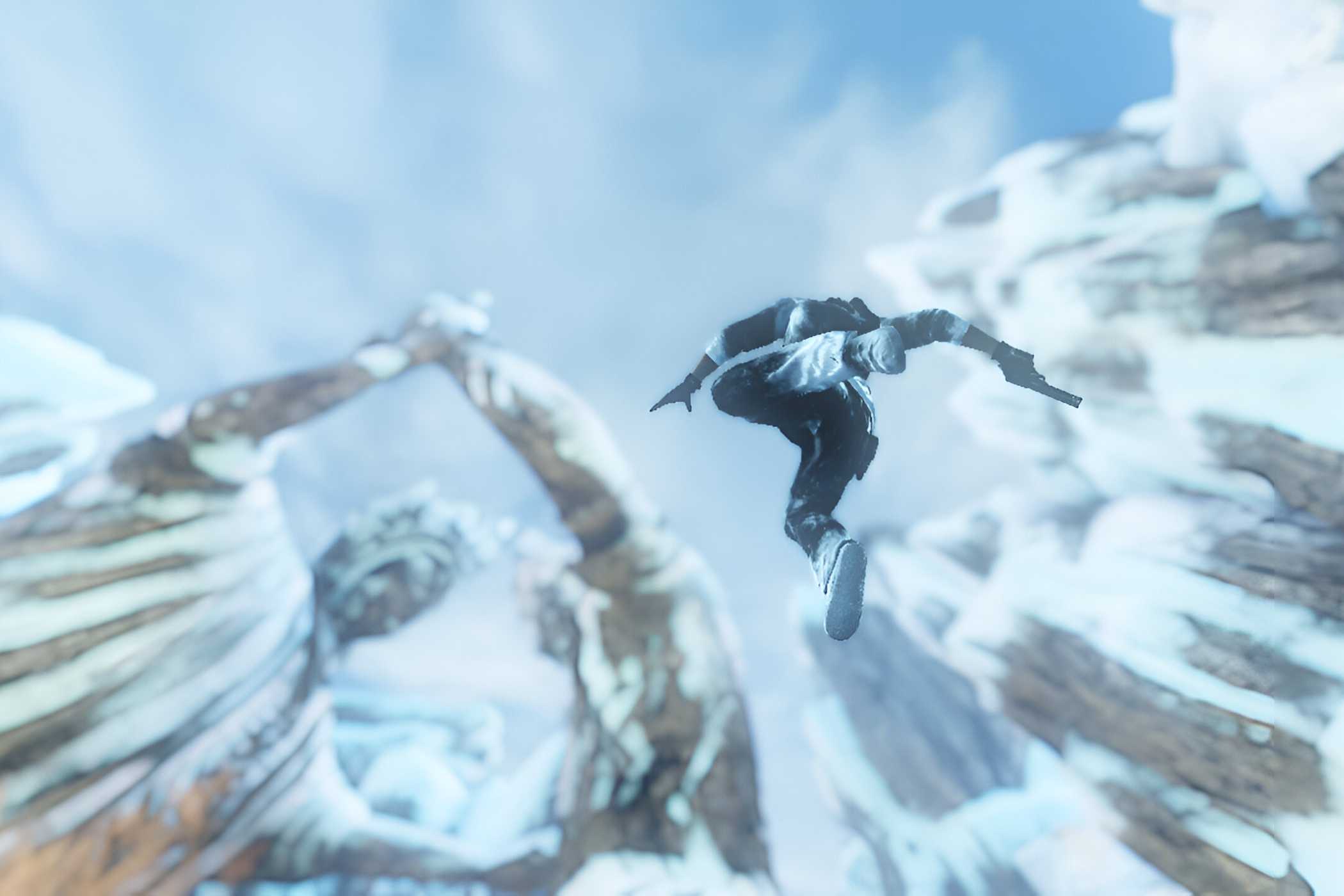 A screenshot from the game Uncharted 2, showing tall, stony statues covered in snow as a human falls down from them.