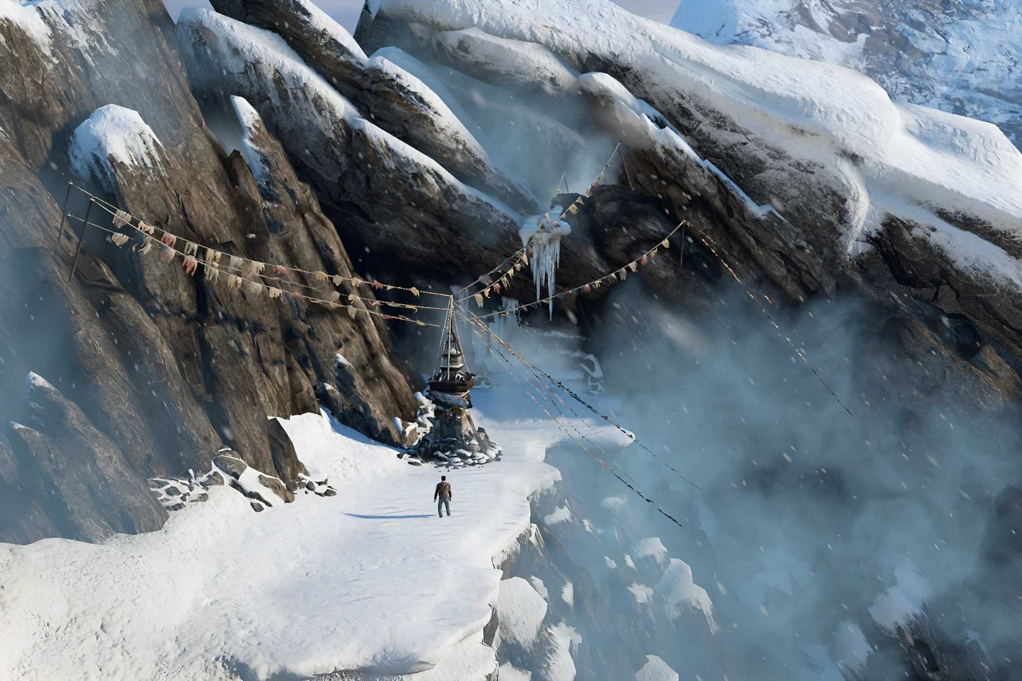 A screenshot from the game Uncharted 2: Among Thieves, showing a snowy Nepali mountain setting.