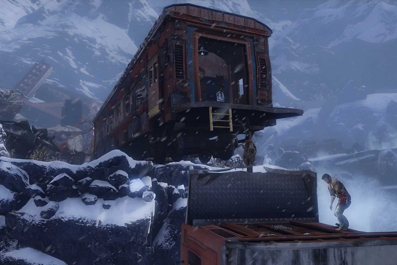 A screenshot from the game Uncharted 2: Among Thieves, showing a derailed train in a snowy mountain with the protagonist standing underneath it.
