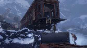 A screenshot from the game Uncharted 2: Among Thieves, showing a derailed train in a snowy mountain with the protagonist standing underneath it.