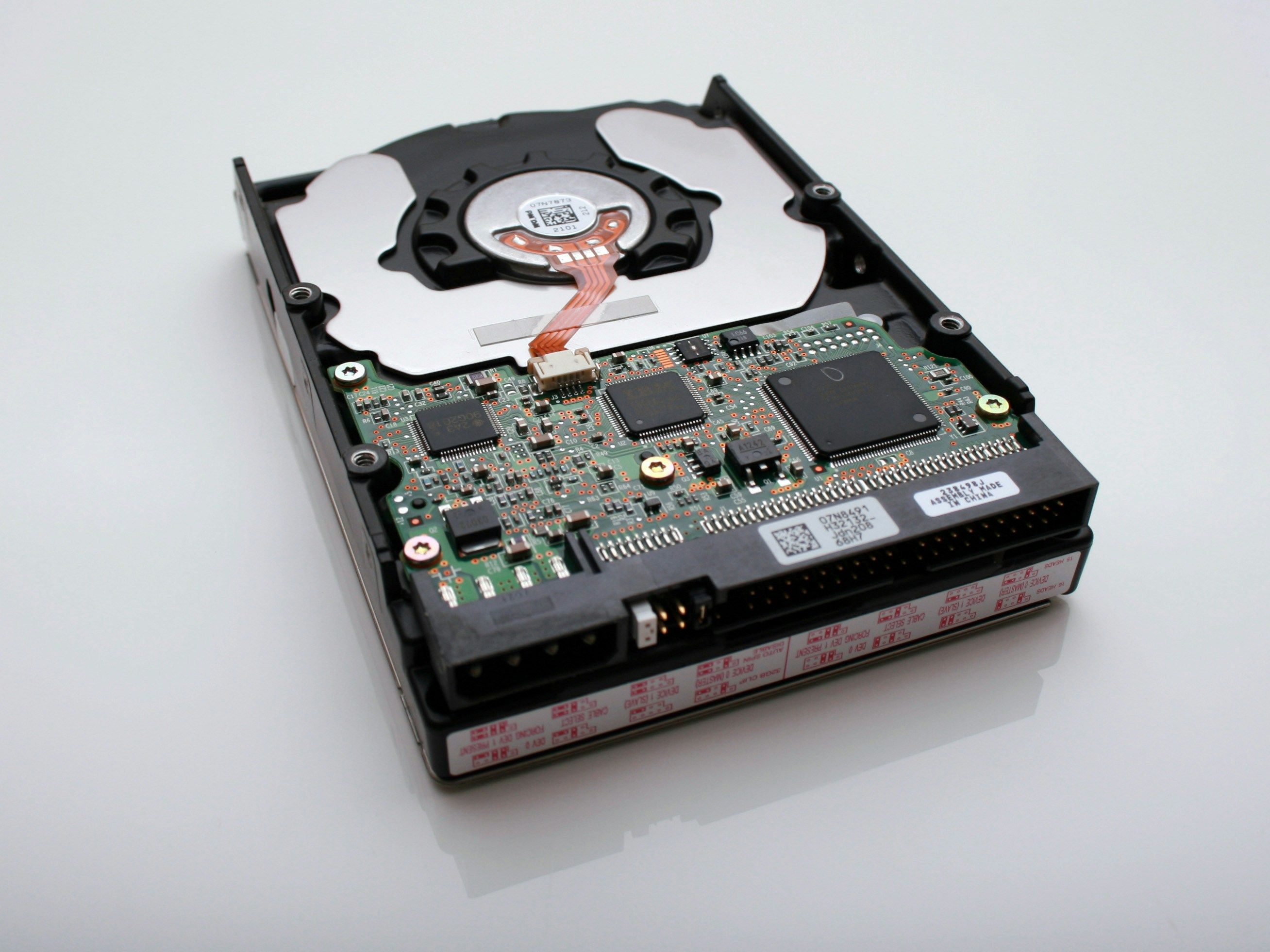 an image of a hard with with exposed circuit board