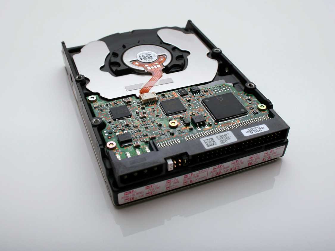 an image of a hard with with exposed circuit board