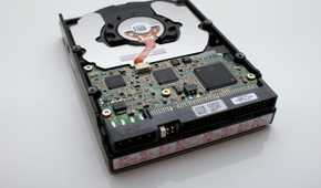 an image of a hard with with exposed circuit board