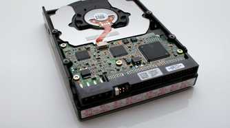 an image of a hard with with exposed circuit board